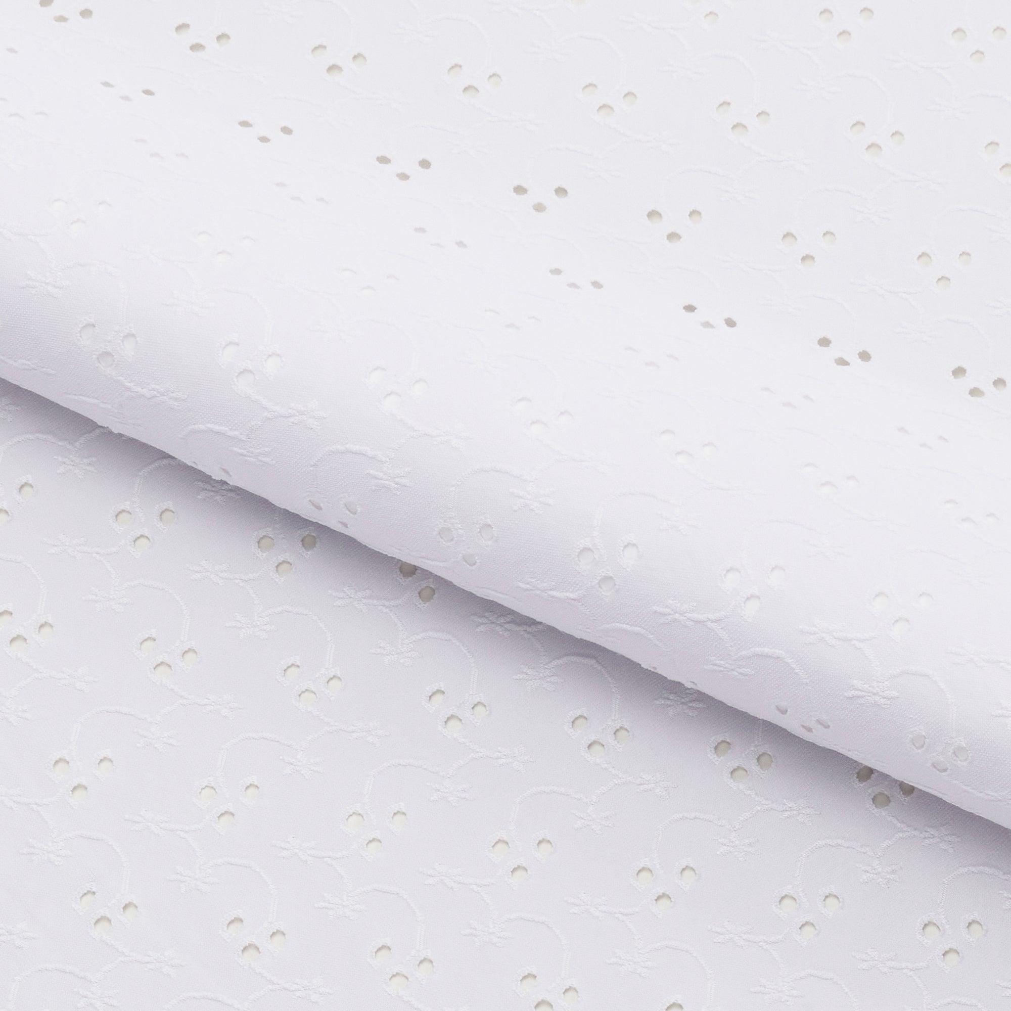 Eyelet Polyester Spandex Jacquard Fabric | Blue Moon Fabrics