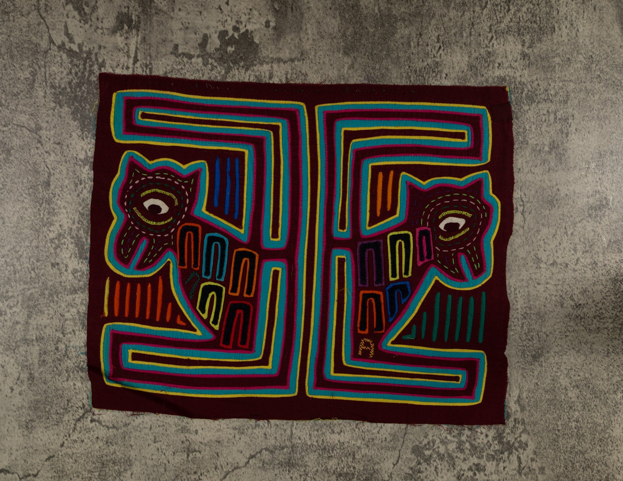 Traditional Maroon And Green Puppy Dog Mola