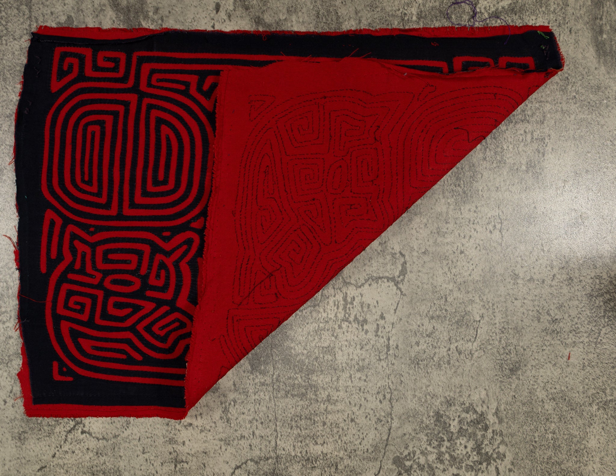 Black And Red Machete And Dog Mola