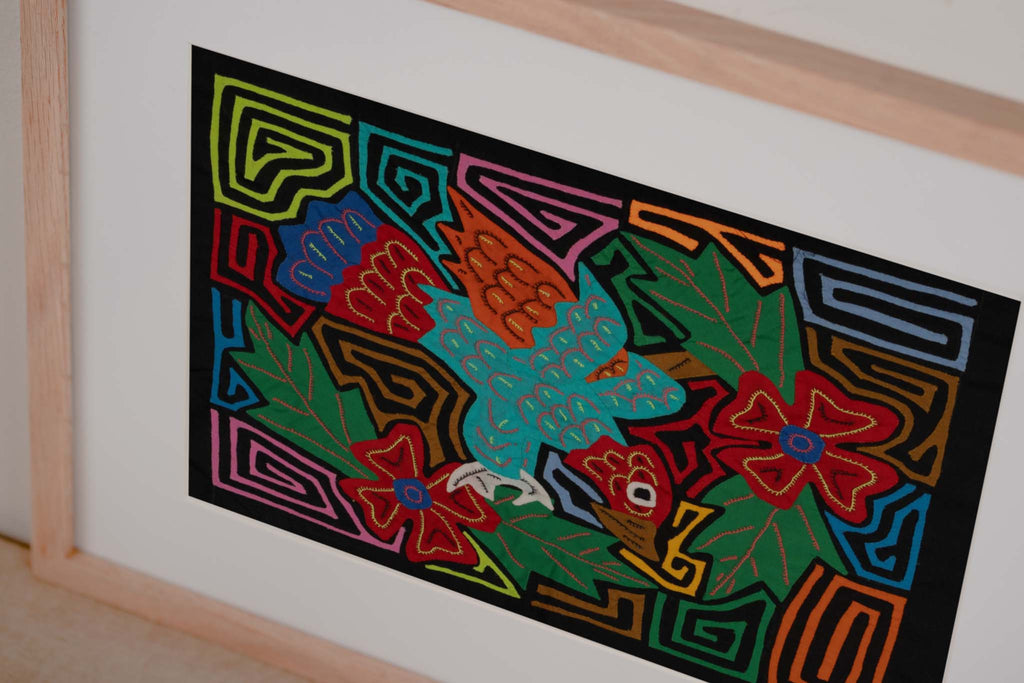 Red Blue And Orange Hurling Parrot Mola