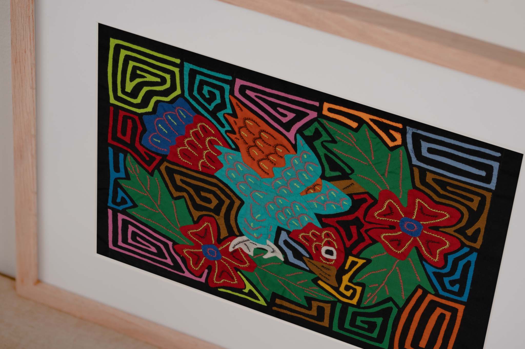 Red Blue And Orange Hurling Parrot Mola