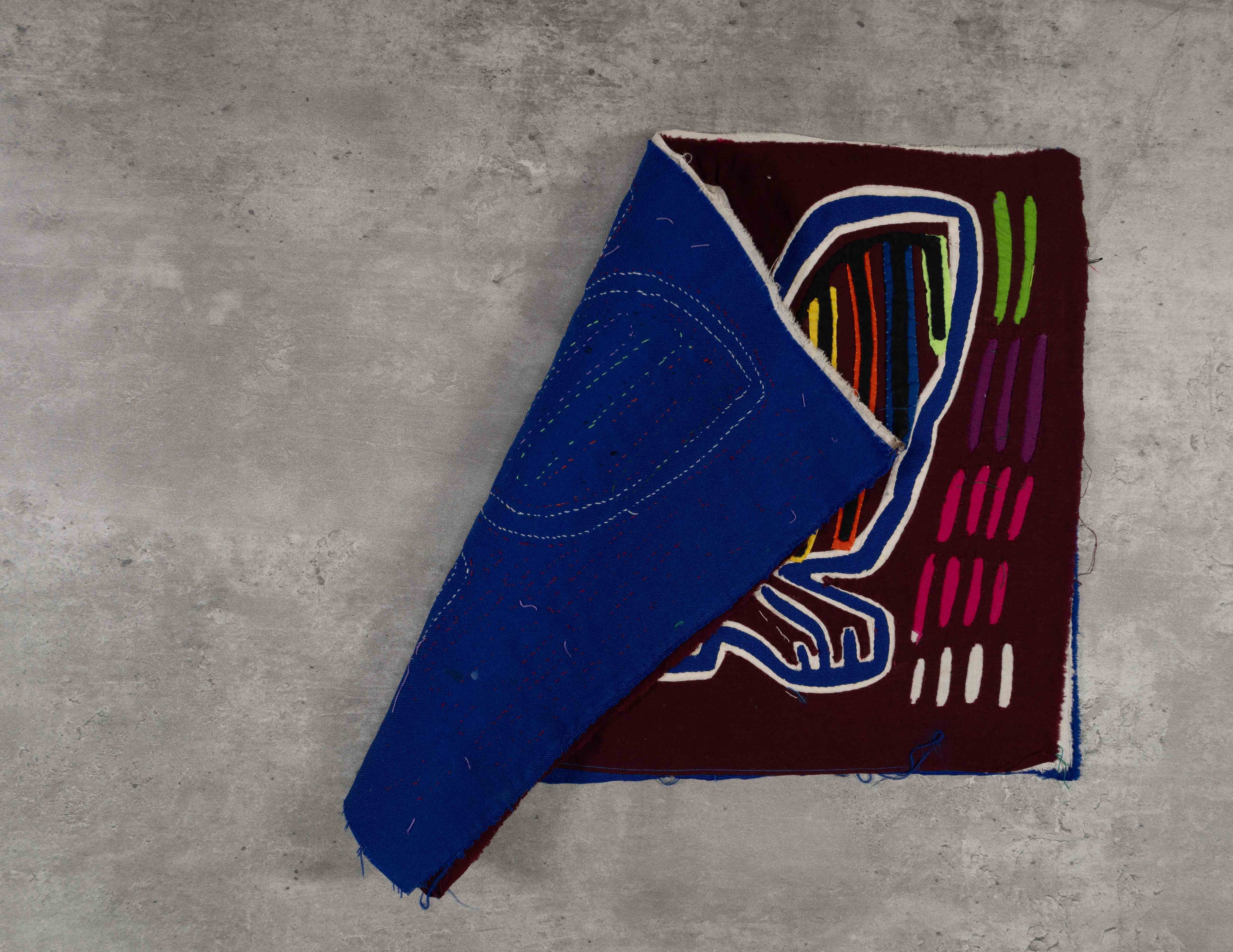 Maroon Blue And White Bird Mola