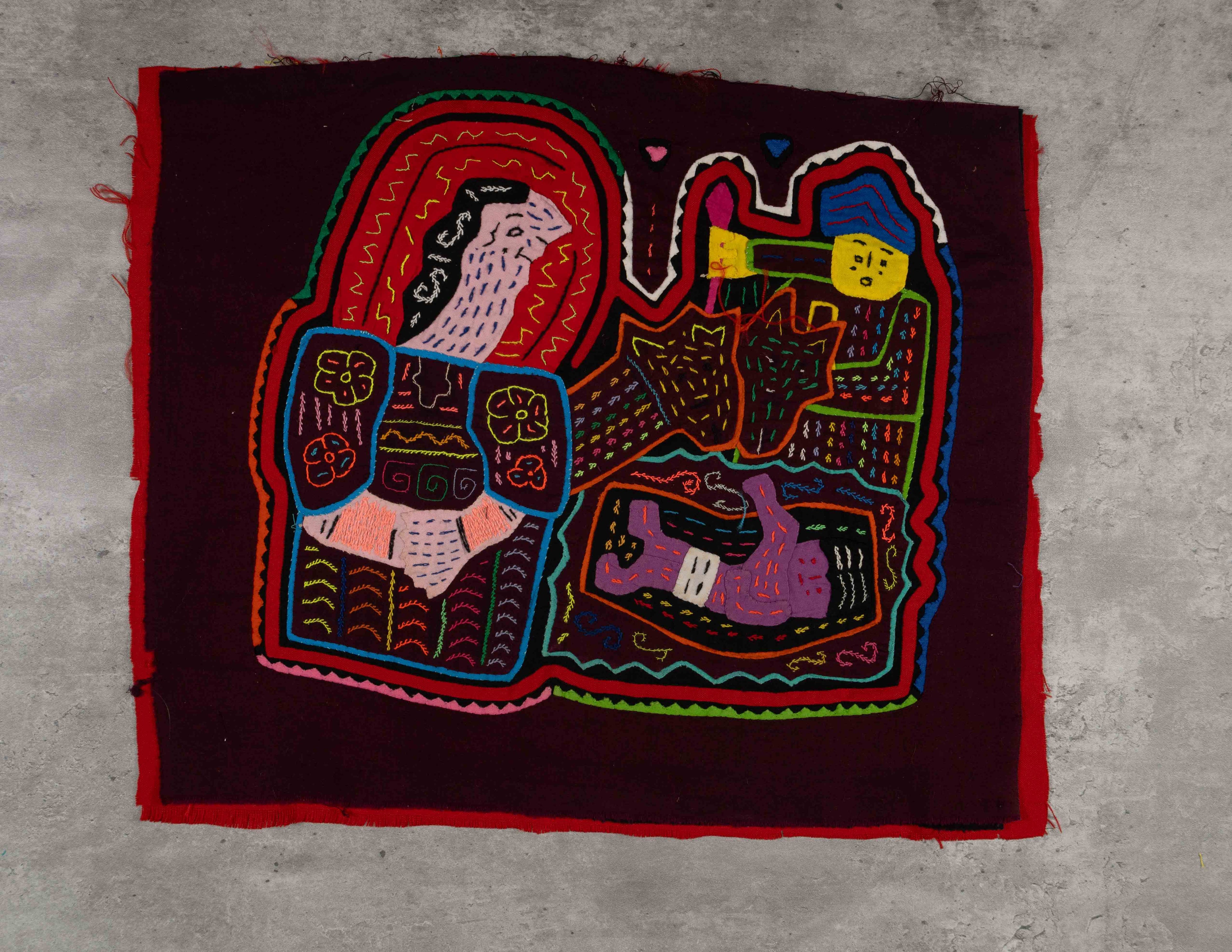 Kuna Woman With Family Life In Village Mola