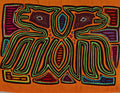 Orange And Green Howling Puppy Dog Mola