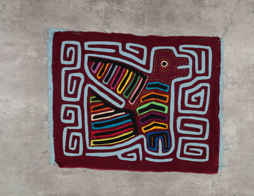 Burgundy And Blue Red Bird Flying South Mola