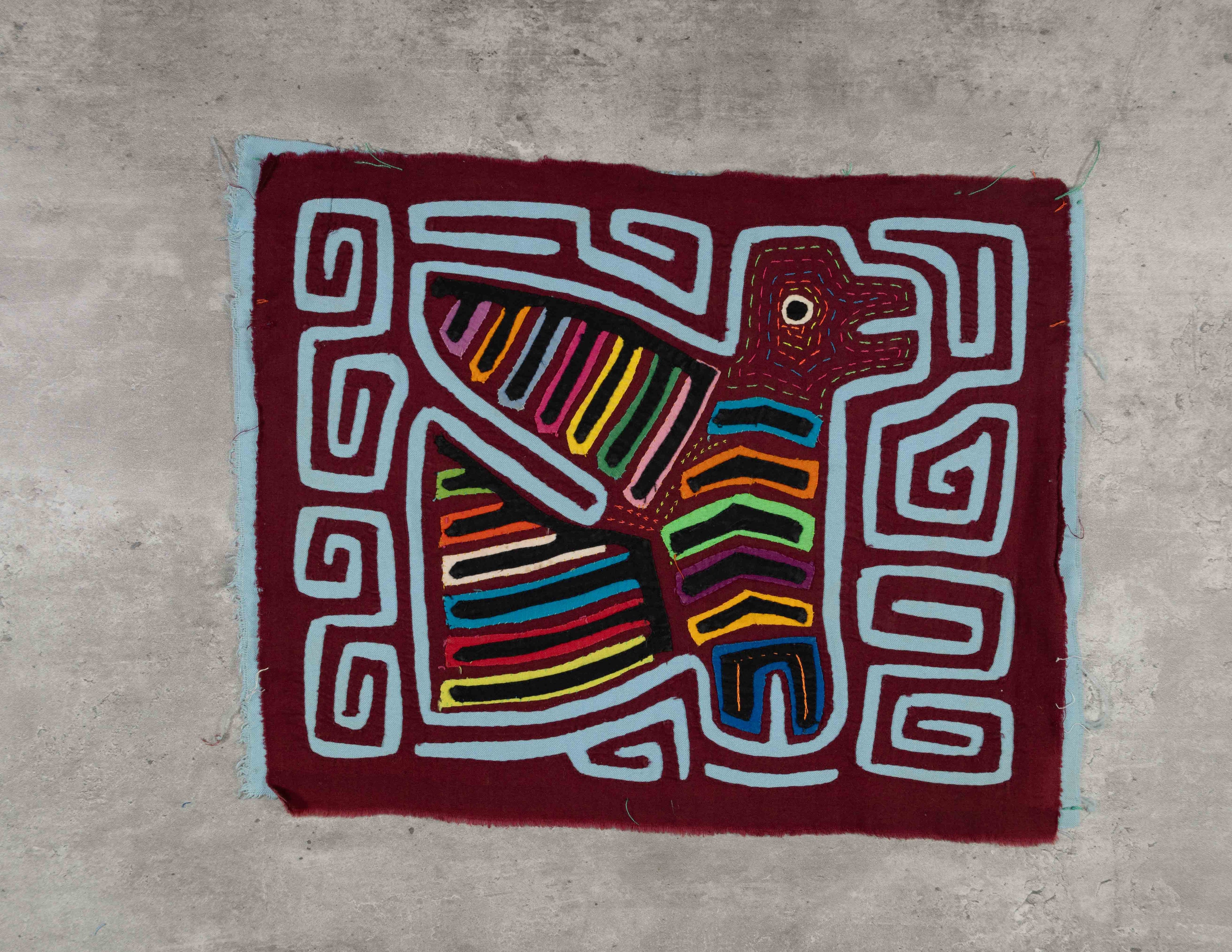 Burgundy And Blue Red Bird Flying South Mola