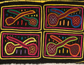 Black And Yellow Pipe Or Maraca Mola