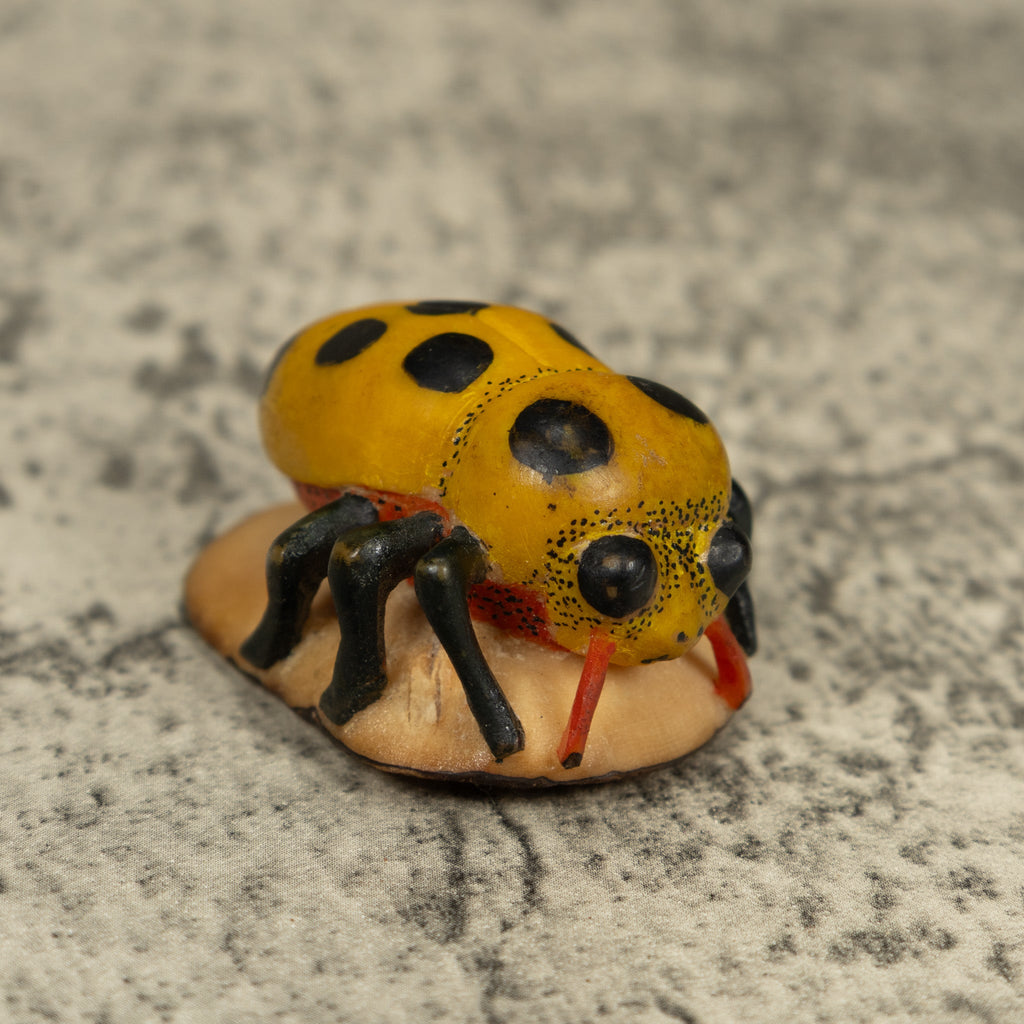 Vintage Black And G9old Insect Bug Tagua Carving