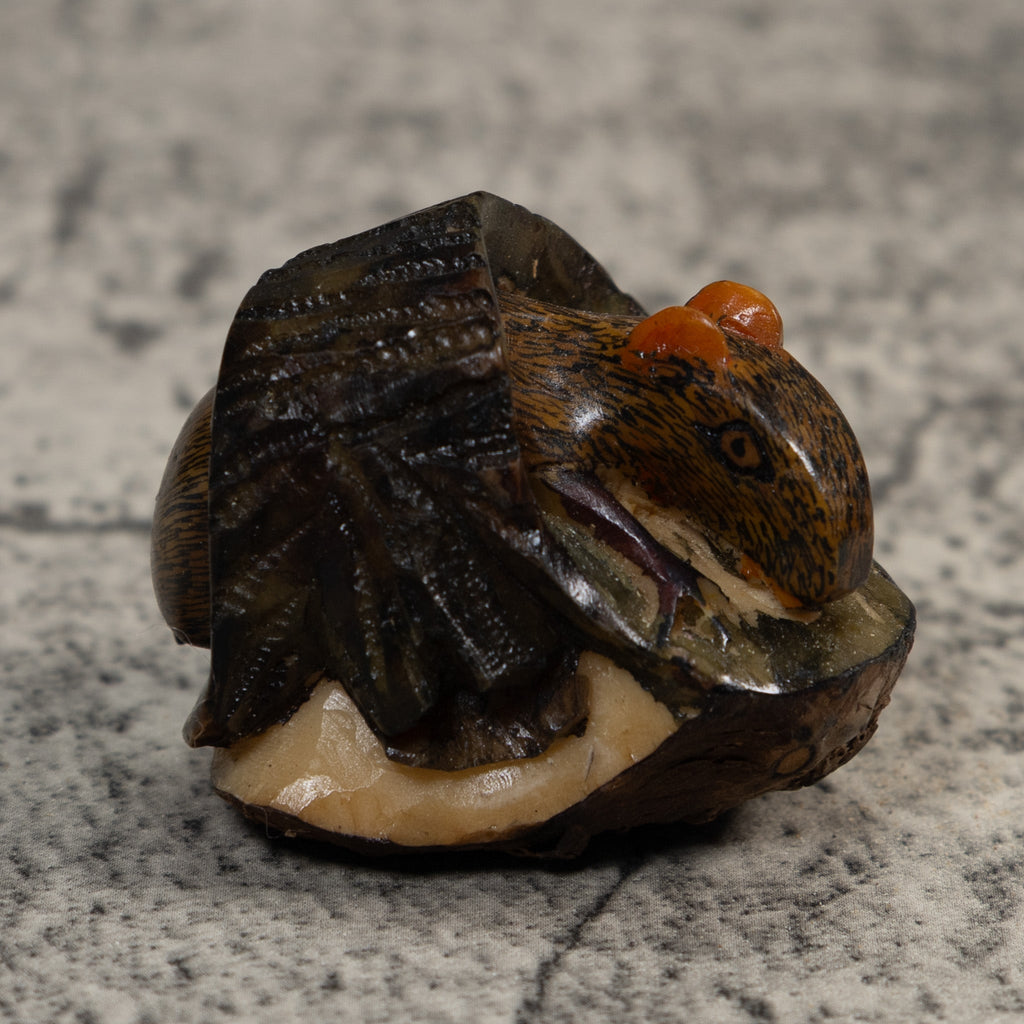 Neque Agouti In Log Tagua Carving