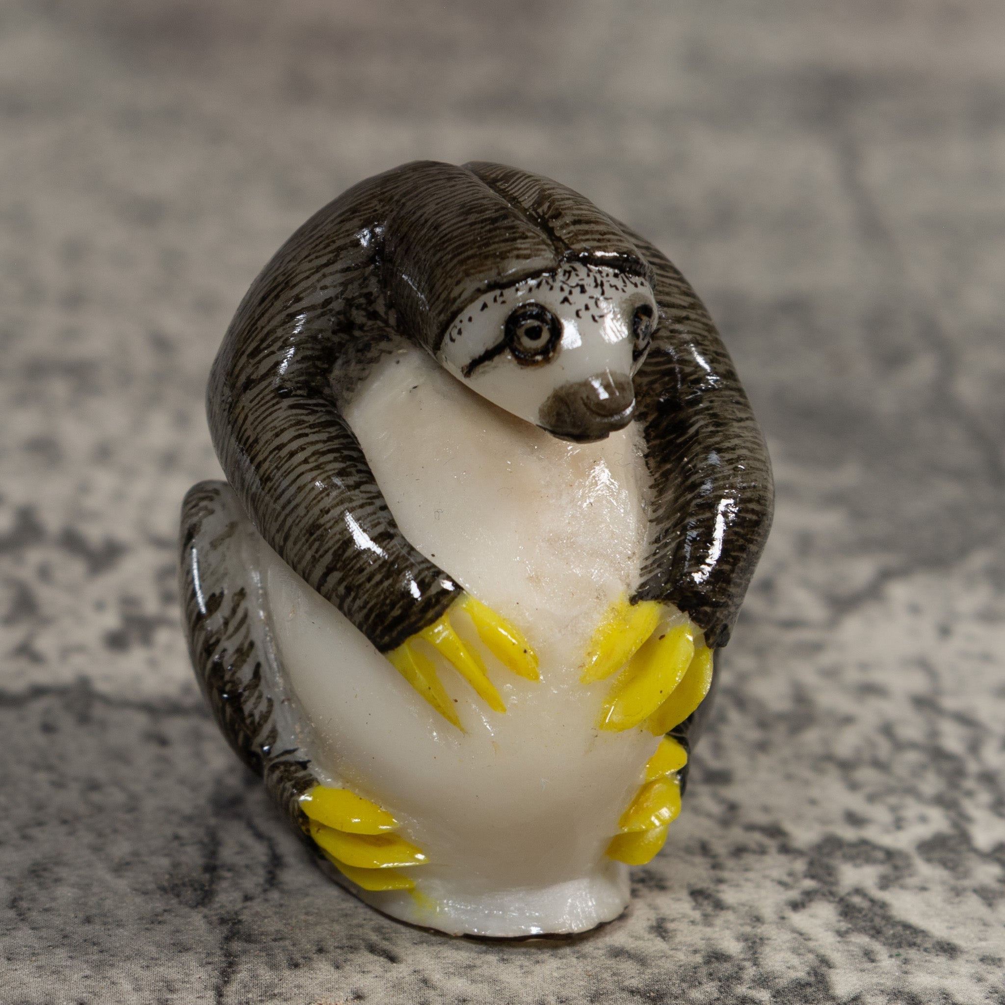 Gray And Yellow Sloth Tagua Carving
