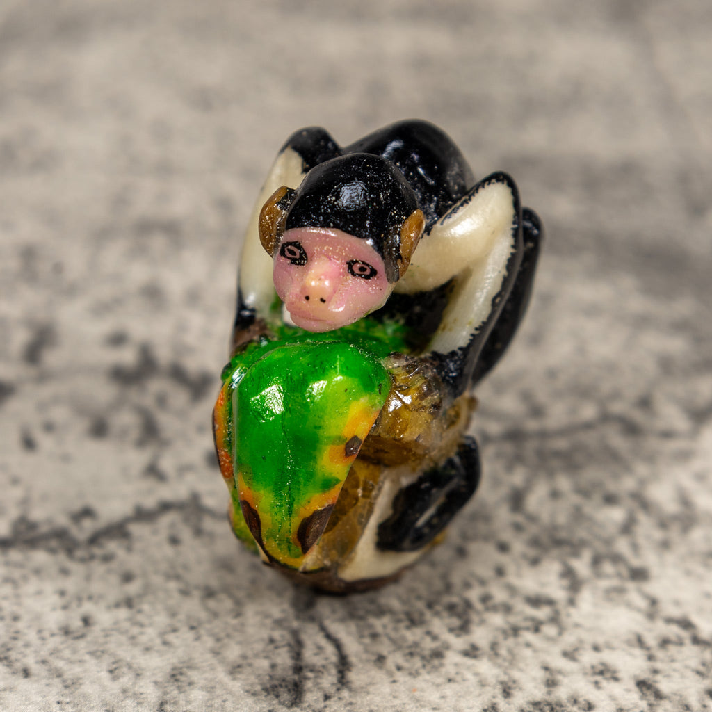 White Face Monkey On Pedestal Tagua Carving