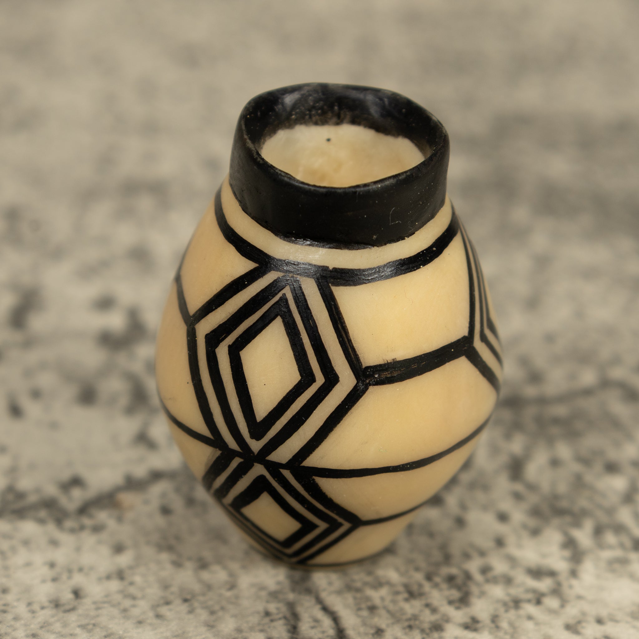 Etched Black Vase Tagua Carving