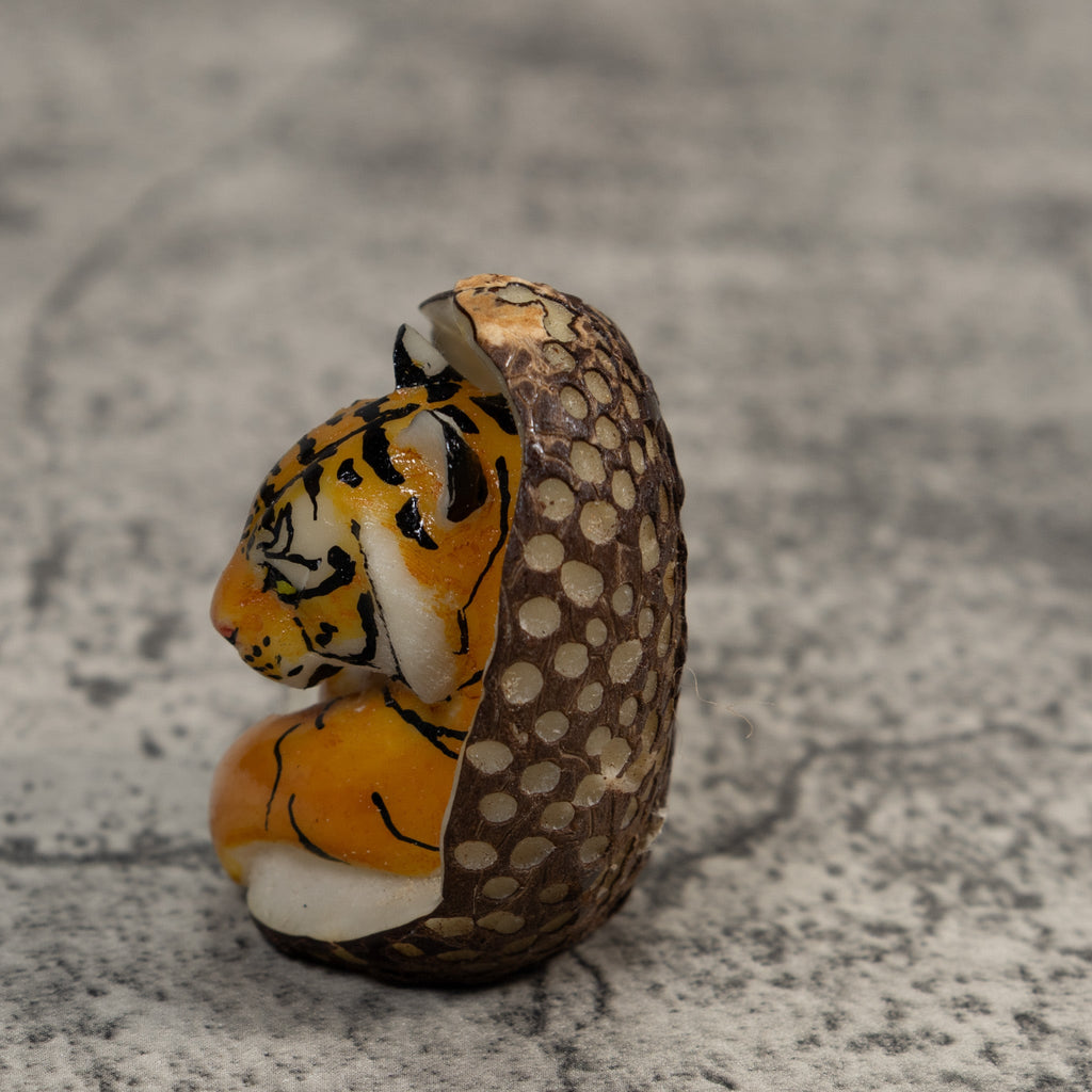 Orange And Black Bengal Tiger in Cave Tagua Carving