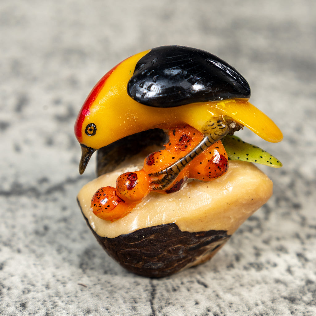 Red Yellow And Black Oriole Bird Tagua Carving