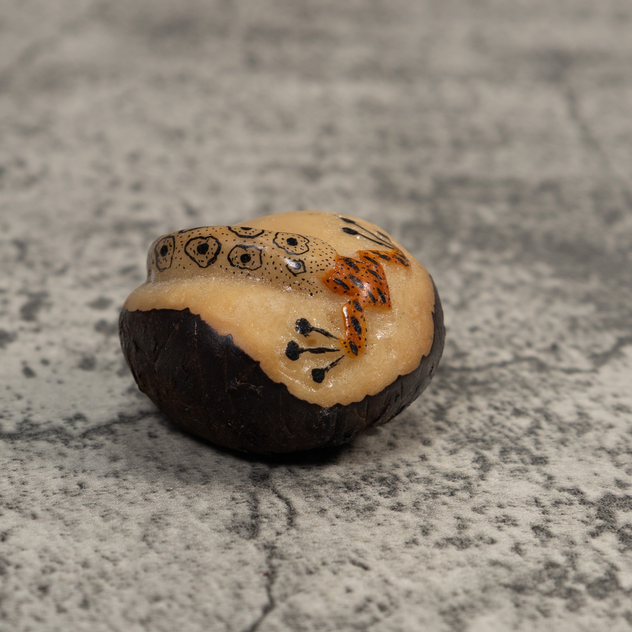 Orange And Black Snake Eating Frog Tagua Carving