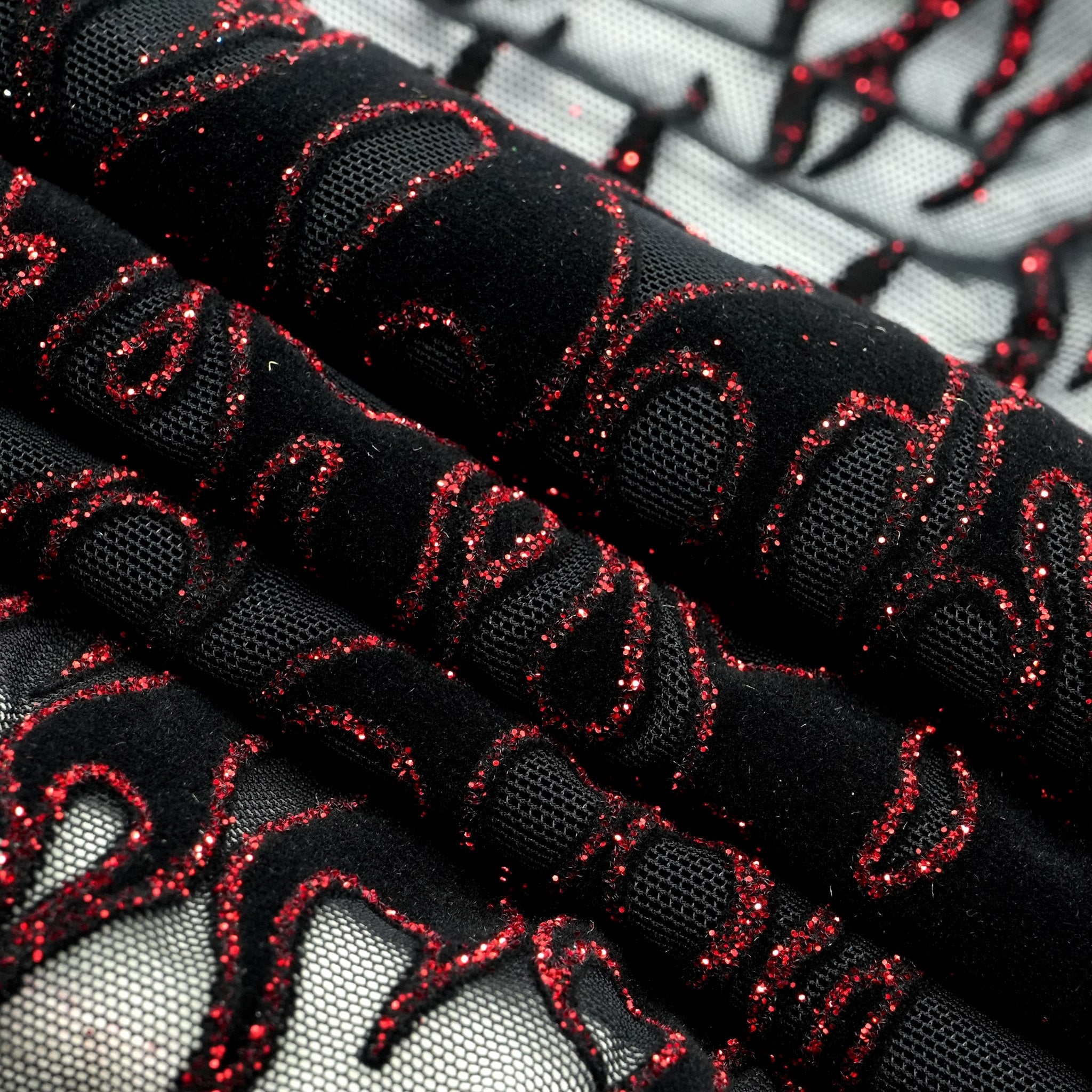 Fiery Glittered Flocked Stretch Mesh Fabric | Blue Moon Fabrics